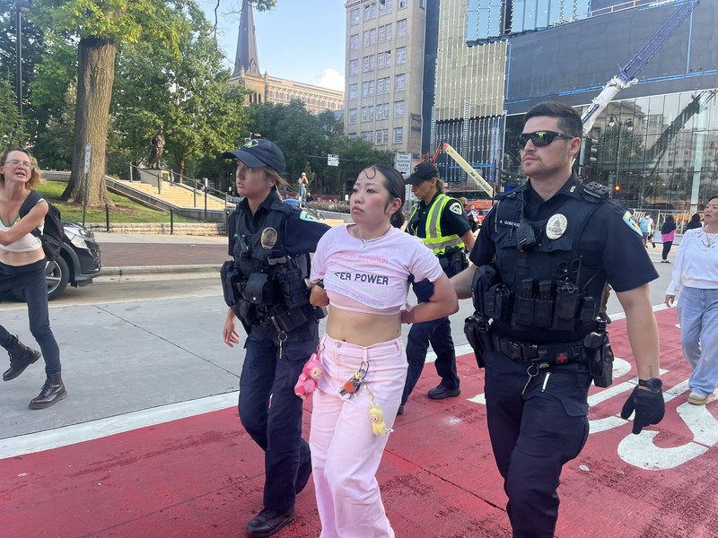 Zon Moua and Hope Vang of Freedom Inc Arrested